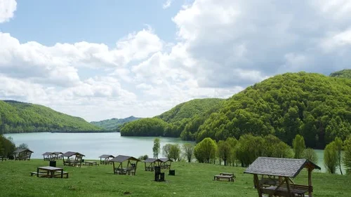 Time Lapse - Cloudscape Over Green Mountain And Lake