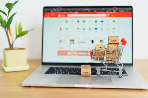 Preview: Boxes with shopping cart on a laptop computer.